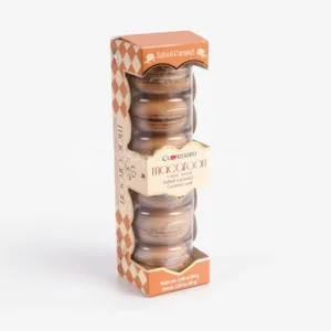 Custom Fancy Macaron Boxes with colorful macarons inside a premium pink box, designed by First Custom Packaging.