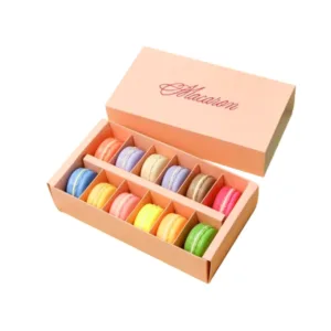 Custom Fancy Macaron Boxes with colorful macarons inside a premium pink box, designed by First Custom Packaging.